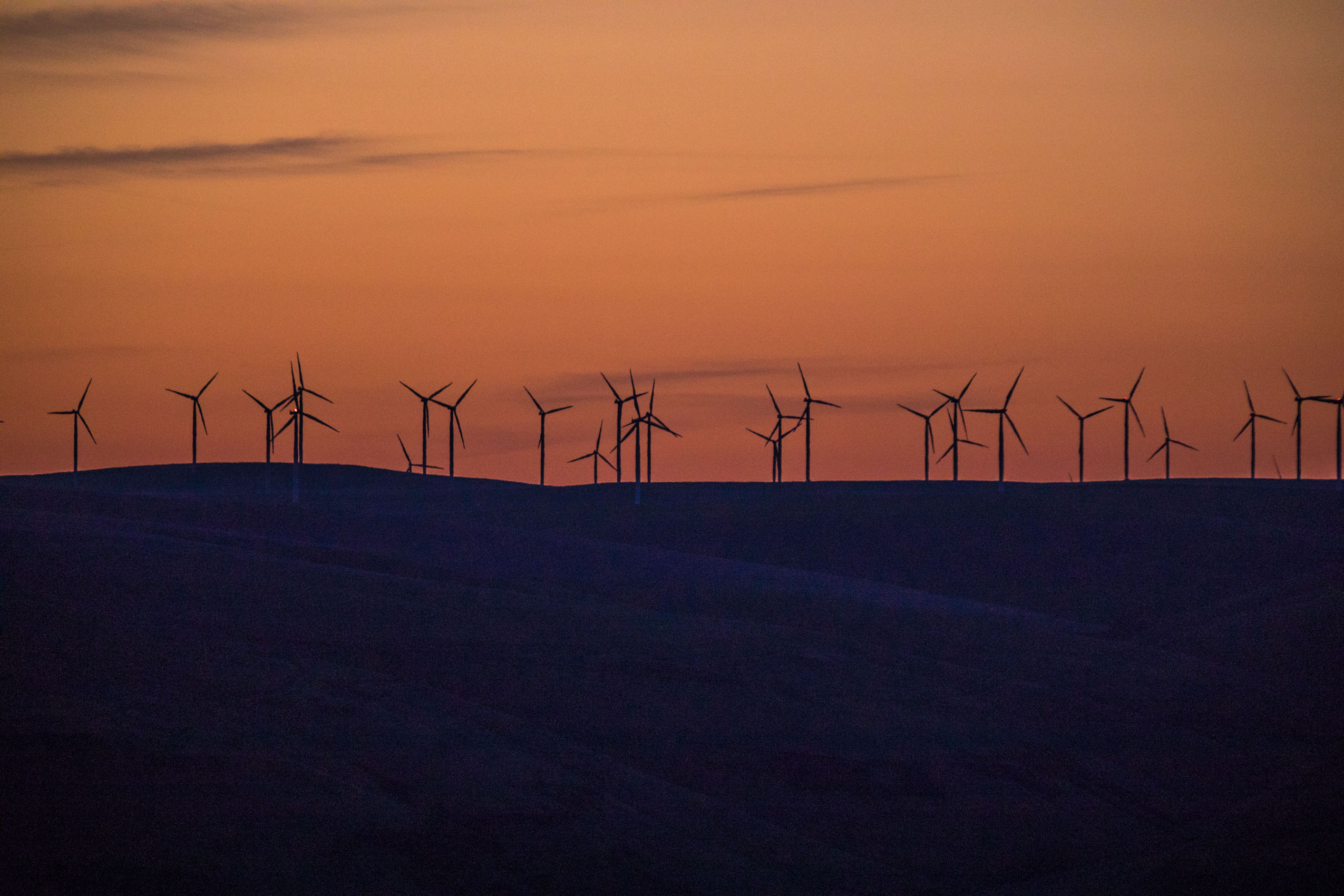 Wind turbines at sunrise energy photographer Rich Crowder
