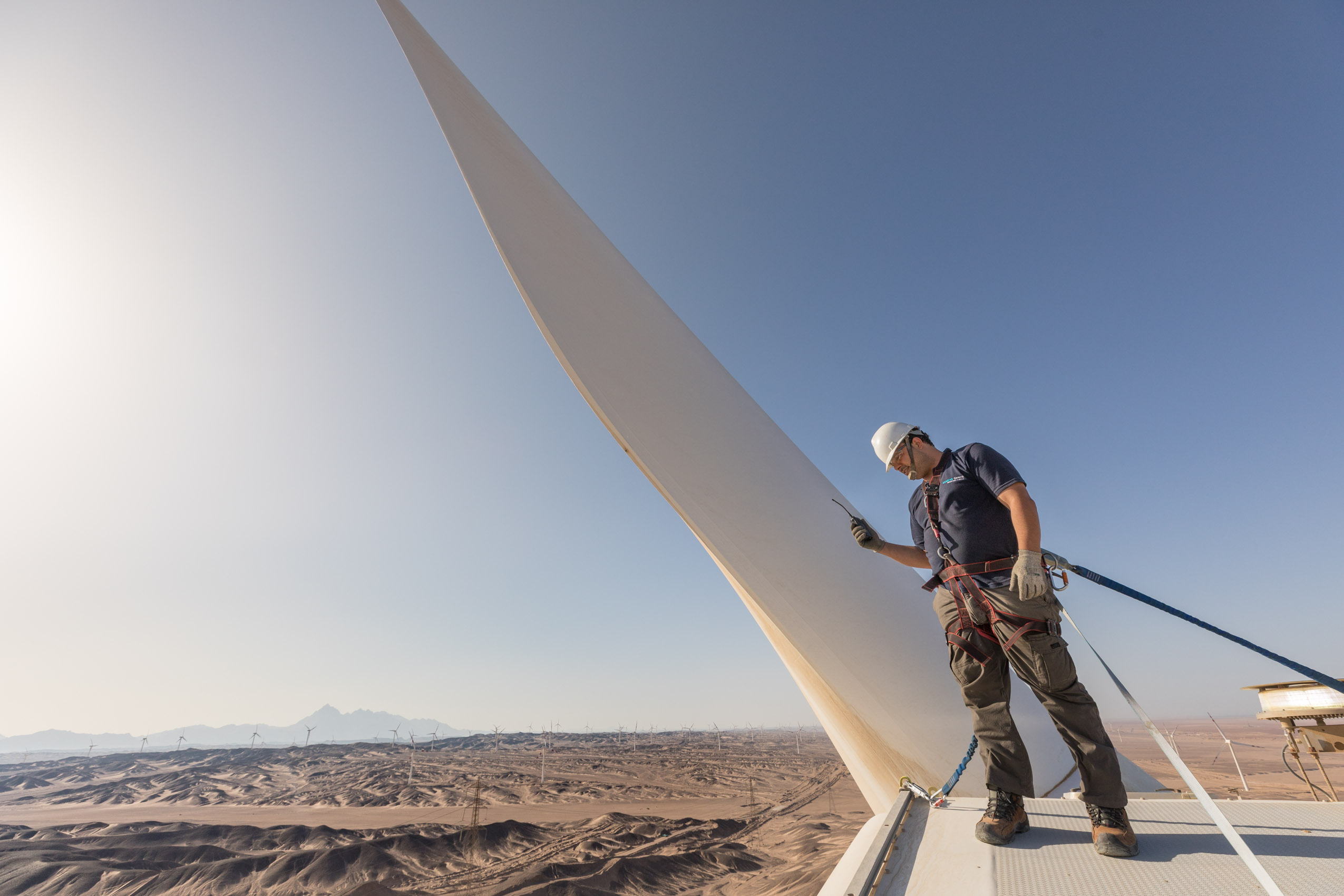 wind turbine farm with technicians in the desert of Egypt, Africa with Siemens Gamesa renewable clean energy Photographer Rich Crowder