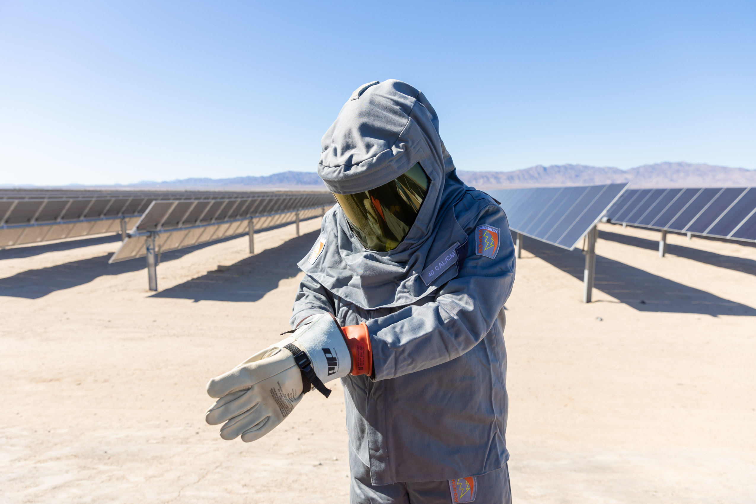 EDF renewables solar array plant mojave desert california with clean renewable energy Photographer Rich Crowder with protective suit