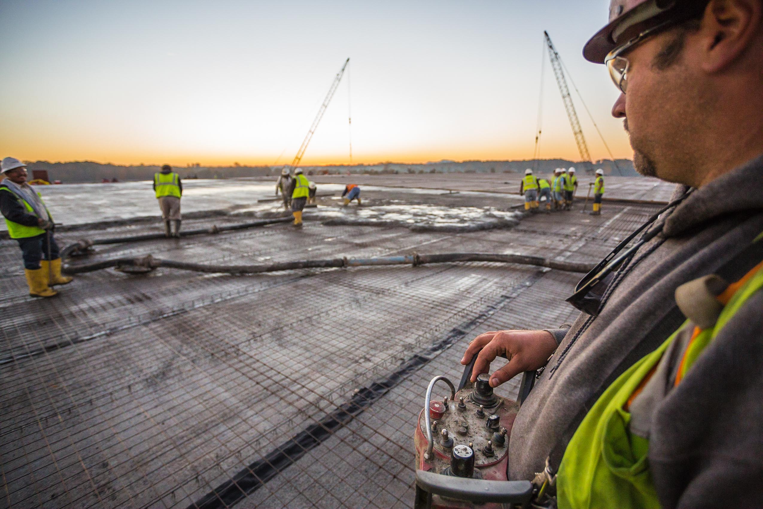 construction worker concrete pour