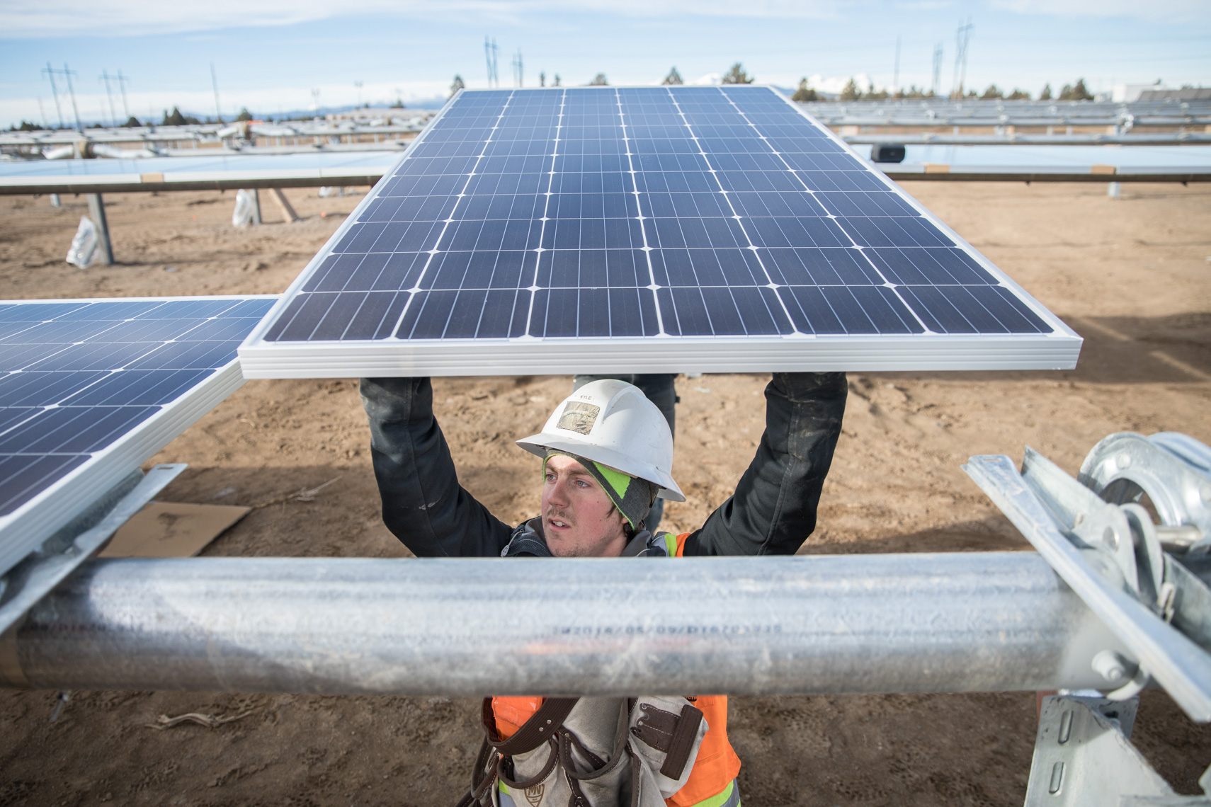 solar energy farm worker