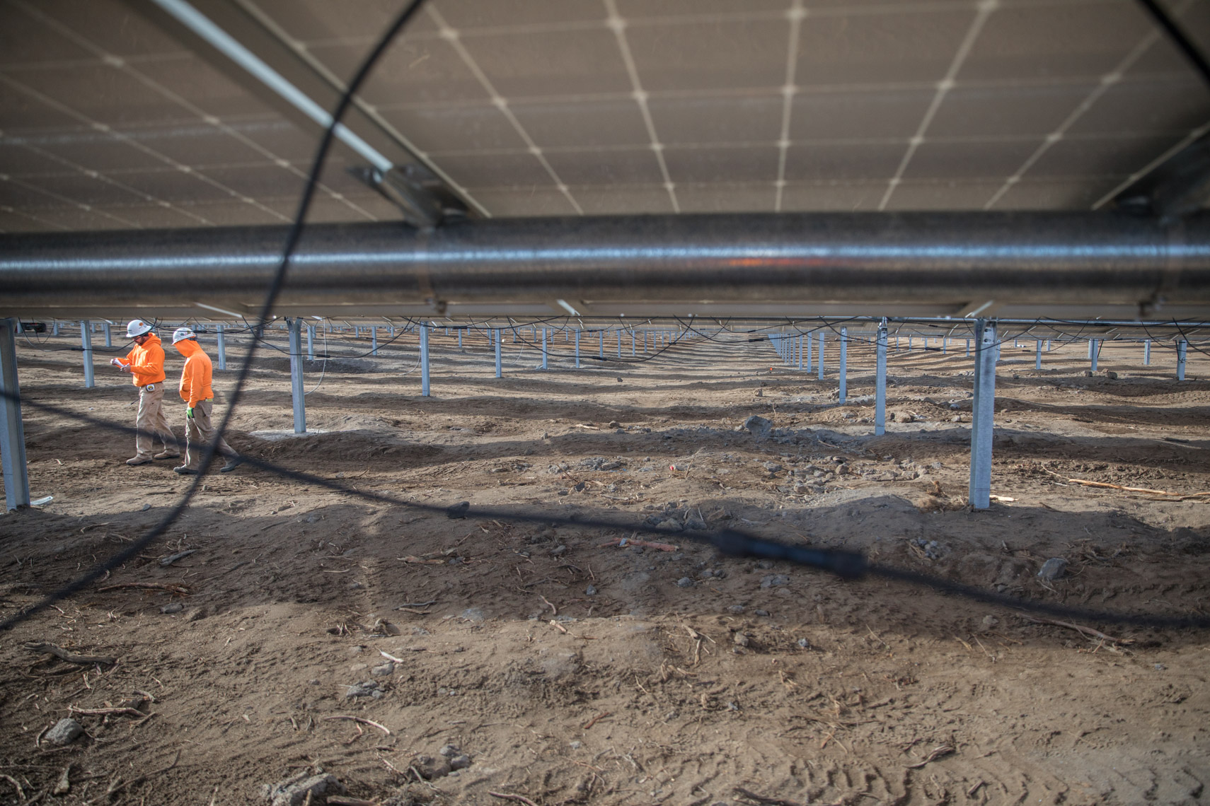 workers with solar farm photography Rich Crowder