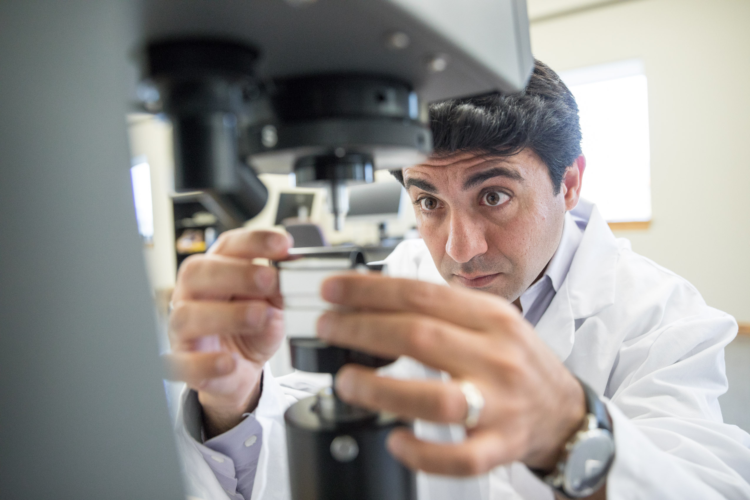 Scientist in manufacturing lab by scientific photographer Rich Crowder